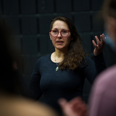 Marina Tsaplina speaking to a group of students