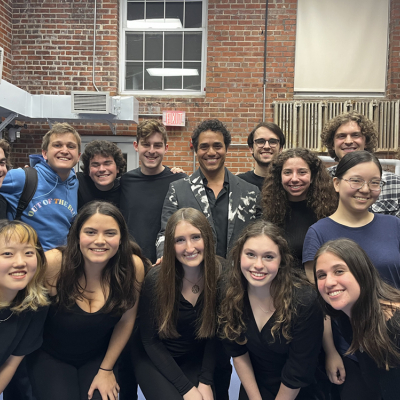 Adam Jacobs with Duke students